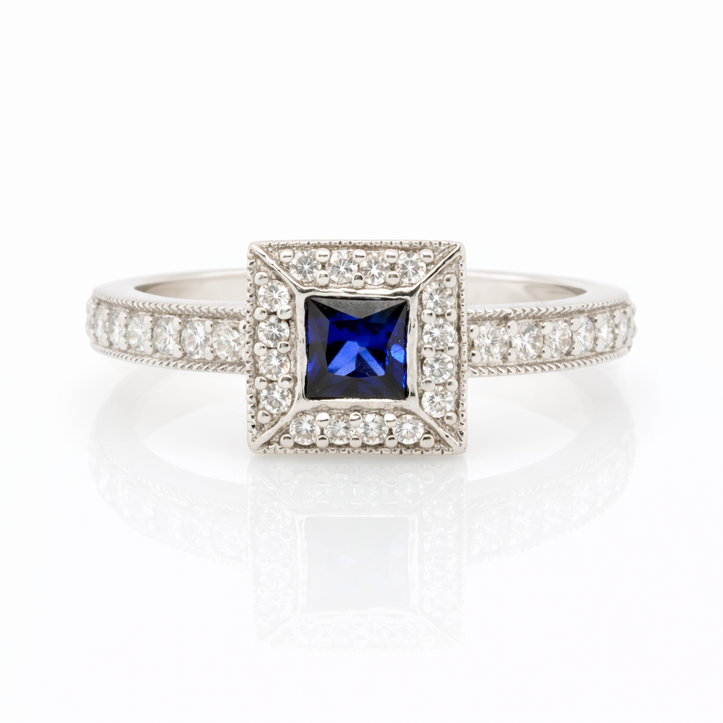 18ct White Gold Sapphire and Diamond Halo Ring