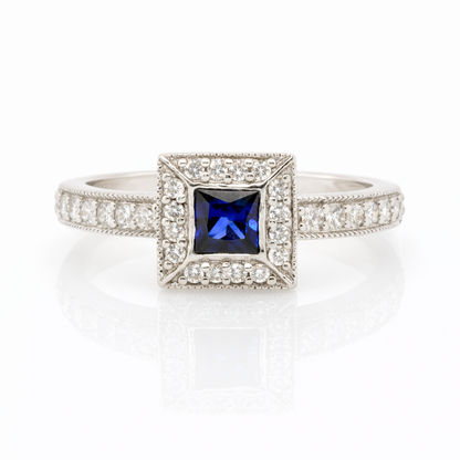 18ct White Gold Sapphire and Diamond Halo Ring