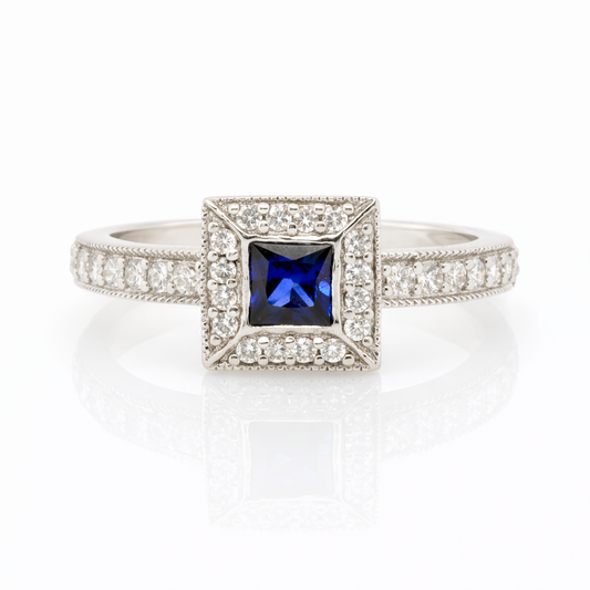 18ct White Gold Sapphire and Diamond Halo Ring